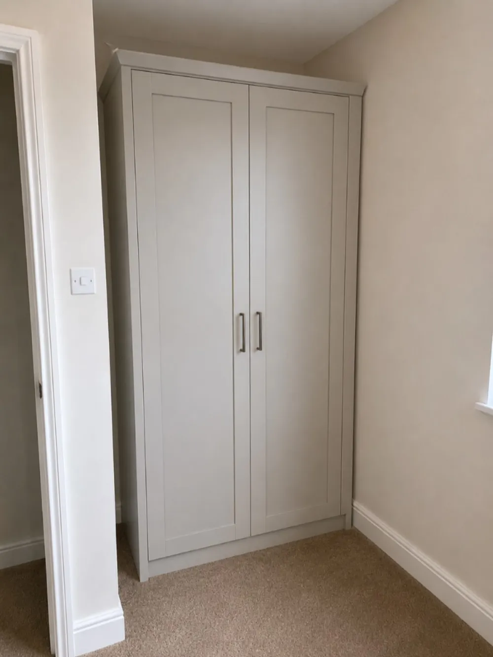 After — assembled fitted wardrobe in a Morningside bedroom